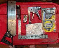 Overview of all items laid on red surface