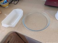Loaf pan and pie dish side by side