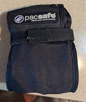 PacSafe branded nylon storage pouch