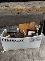 overview of assorted items in Omega box