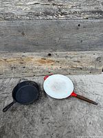 Both skillets side by side for scale and comparison
