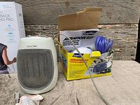 Calore heater and Laguna Aeration Kit box with contents visible