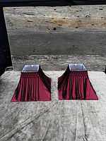 Both matching square burgundy shades side by side