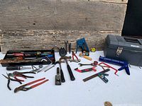 Overall view of toolbox and array of tools on table