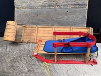 Both the Mastercraft toboggan and Vagabond sled side by side