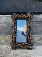 Full view of twig-framed rectangular mirror