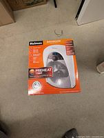 Front of sealed Holmes bathroom heater box showing features
