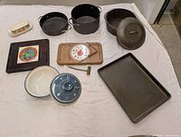 Group shot of entire lot on white cloth