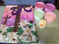 Banner, four baskets, candle, boxed pot displayed