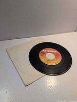Front of 7-inch record in plain white sleeve
