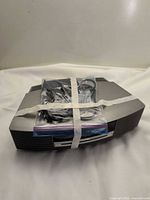Top view of Bose Wave Music System with bundled power cord on top