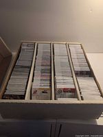 Top view of open four-row box filled with hockey cards