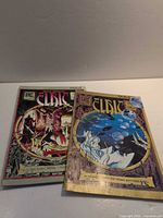 Front covers of both Elric comic issues