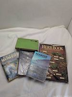 All five books laid out showing covers