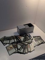 cards spread and metal storage box