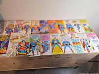 All 21 Superman tall slim greeting cards laid out on table, showing full assortment