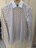 Front view of Prada geometric print dress shirt