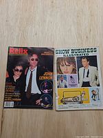 Both magazine front covers side by side