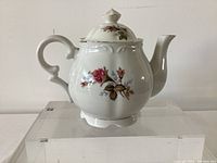 front view of ceramic Moss Rose musical teapot