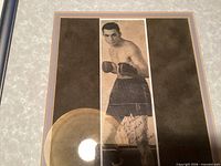 Front view of framed signed photograph showing Barney Ross image