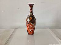 Front view of slender floral porcelain vase
