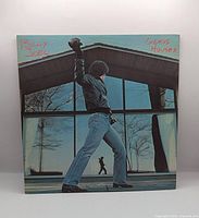 Front album jacket showing title and artwork