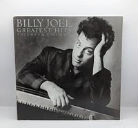 Front cover with album title and Billy Joel portrait