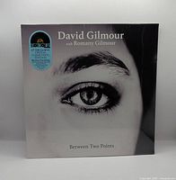 Front of sealed LP showing cover art and hype sticker