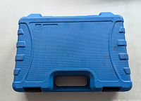 closed blue plastic case top view