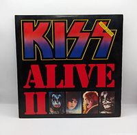 Front cover showing KISS logo and album title