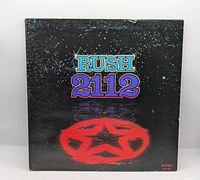 Front cover showing Rush 2112 artwork