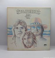 Front album cover showing Stampeders New Day artwork