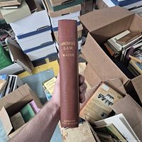 Spine of the book showing title, author, publisher