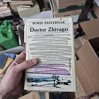 Front cover of Doctor Zhivago dust jacket held in hand