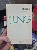 Front cover showing title, author, translator, publisher mark and condition