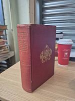 Spine view showing title, publisher, cloth colour, gilt detail
