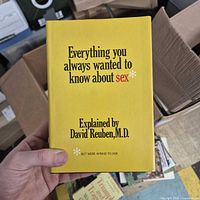 Front cover of yellow dust-jacketed hardcover book