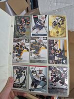 Full 9-card binder page showing Buffalo Sabres players including Drew Stafford, Thomas Vanek and others