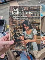 Front cover of Nature's Healing Arts book with dust jacket