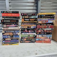 Overall view showing three stacks of paperback books