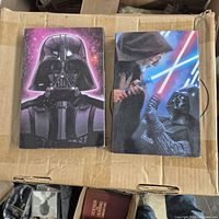 Front covers of both Star Wars illustrated hardcovers