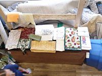 Overall view of folded linens on chest