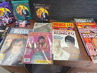 Table overview showing three Kung Fu DVD season sets and multiple martial-arts magazines