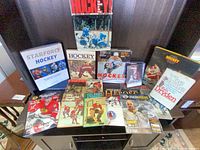Full lot overview showing books, magazines and video cases on shelving