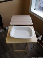 Top view showing both folding tables and ceramic dish