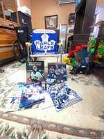 Group shot showing all printed items and the folding chair