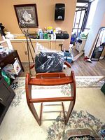 Valet stand front view with jacket in packaging on hanger