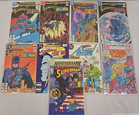 Front view showing all nine comics in sleeves