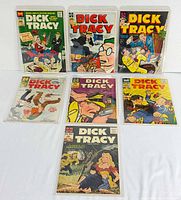 Front view of all seven Dick Tracy comic books in sleeves