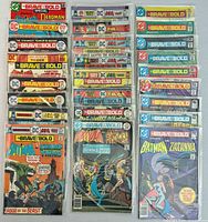 25 bagged Brave and the Bold comics laid out in rows